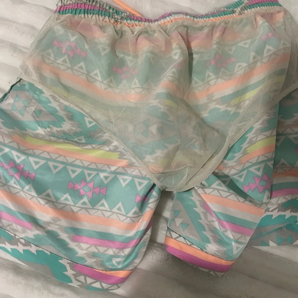 Chubbies Teal and Pink Patterned Swim Trunks